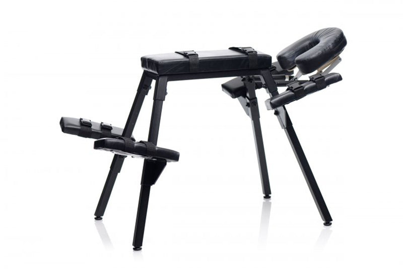 UABDSM Extreme Sex Bench — black powder-coated steel frame, padded body rest, integrated knee and head rests, splayed legs.